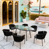 SFTZ260501 Black Woven Tropical Coastal Luxury Outdoor Dining Set with Dark Grey Cushions & Oval Glass Dining Table – Stylish Patio Furniture