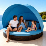 TYSF2626 Dark Brown Rattan Round Enclosed Outdoor Daybed with Bright Blue Canopy & Matching Cushions – St. James Barbados Coastal Terrace Luxury Family Outdoor Round Daybed