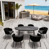 SFTZ260501 Black Woven Tropical Coastal Luxury Outdoor Dining Set with Dark Grey Cushions & Oval Glass Dining Table – Stylish Patio Furniture
