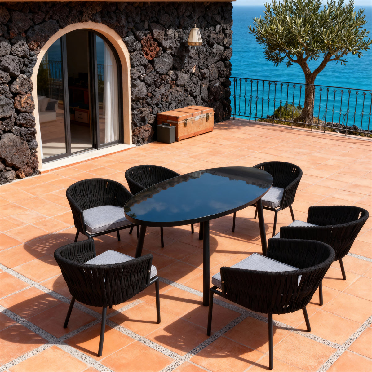 Black Woven New England Coastal Outdoor Dining Set with Light Grey Cushions & Oval Glass Dining Table – Stylish Patio Furniture