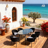 SFTZ260502 Black Woven New England Coastal Outdoor Dining Set with Light Grey Cushions & Oval Glass Dining Table – Stylish Patio Furniture