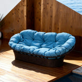 TYSF2563 Brown Rattan Curved Plush Outdoor Sofa with Turquoise Cushions – Bridgetown Barbados Coastal Terrace Luxury Relaxed Outdoor Curved Sofa