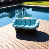 TYSF2563 Brown Rattan Curved Plush Outdoor Sofa with Turquoise Cushions – Bridgetown Barbados Coastal Terrace Luxury Relaxed Outdoor Curved Sofa