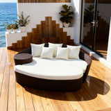 TYSF2577 Cream Rattan Curved Outdoor Sofa with Fiery Red Cushions & Side Table – Rio de Janeiro Brazil Coastal Terrace Luxury Vibrant Outdoor Curved Sofa