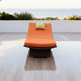 TYSF2600 Dark Brown Rattan Curved Outdoor Sun Lounger with Vibrant Orange Cushion & Lime Green Pillow – Brač Croatia Coastal Terrace Luxury Vibrant Outdoor Sunbed