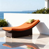 TYSF2600 Dark Brown Rattan Curved Outdoor Sun Lounger with Vibrant Orange Cushion & Lime Green Pillow – Brač Croatia Coastal Terrace Luxury Vibrant Outdoor Sunbed