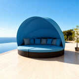 TYSF2626 Dark Brown Rattan Round Enclosed Outdoor Daybed with Bright Blue Canopy & Matching Cushions – St. James Barbados Coastal Terrace Luxury Family Outdoor Round Daybed