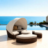 TYSF2626 Dark Brown Rattan Round Enclosed Outdoor Daybed with Bright Blue Canopy & Matching Cushions – St. James Barbados Coastal Terrace Luxury Family Outdoor Round Daybed