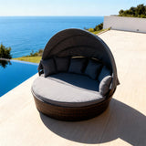 TYSF2628 Dark Brown Rattan Round Enclosed Outdoor Daybed with Dark Grey Canopy, Cushions & Pillows – Malibu California Coastal Terrace Luxury Family Outdoor Round Daybed
